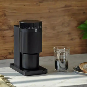 Kaffismillen - Barista an Espresso